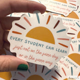 Sticker with a half sunshine with colorful rays with the george evans quote that says: "every student can learn just not on the same day or in the same way"
