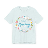 Light blue tshirt that says "hello spring" and includes a flower border and 8 symbol cards commonly used with AAC and special education