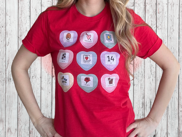 Red shirt with candy heart that have PECS with words about Valentine's Day 