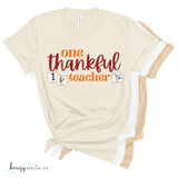 Bella Canvas shirts with One Thankful Teacher text and symbols